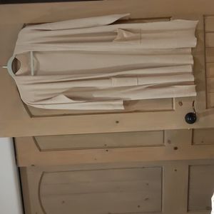 Knee length sweater in tan, size small, by "debut".